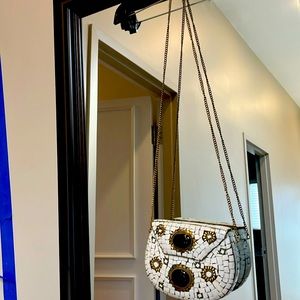 Artisanal crossbody in stone. Beautiful addition to your wardrobe